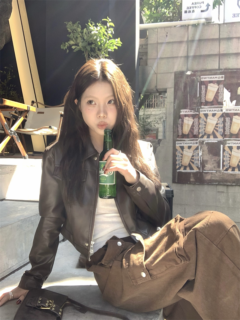 Actual shot of brown retro leather jacket, autumn coffee color right shoulder jacket top for women