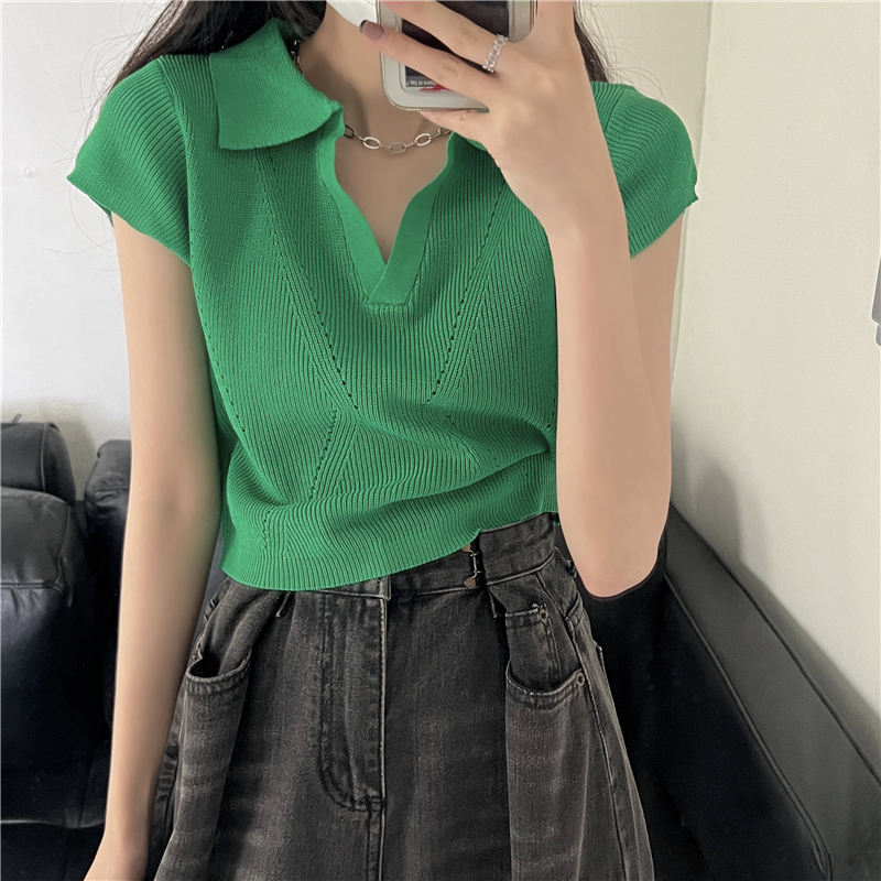 Real shooting, real price, Korean version, new European and American style, solid color, temperament, lapel, short hollow out knitted top, women's Taobao