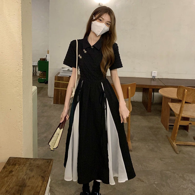 Cheongsam style dress women's spring and summer 2022 new design sense medium long high-end sense narrow waist short sleeved skirt