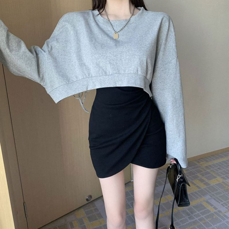 Autumn and winter design dress suit 2022 new backless short sweater bag hip suspender skirt two-piece women