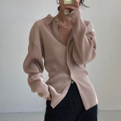 A small collection of pleated dark minimalist shirts