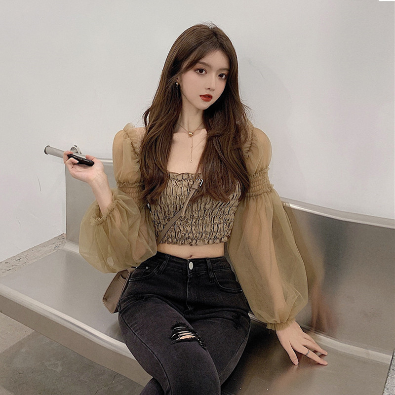 Design sense super fairy 2023 spring new Korean version of mesh stitching off-the-shoulder folds short long-sleeved shirt women's top