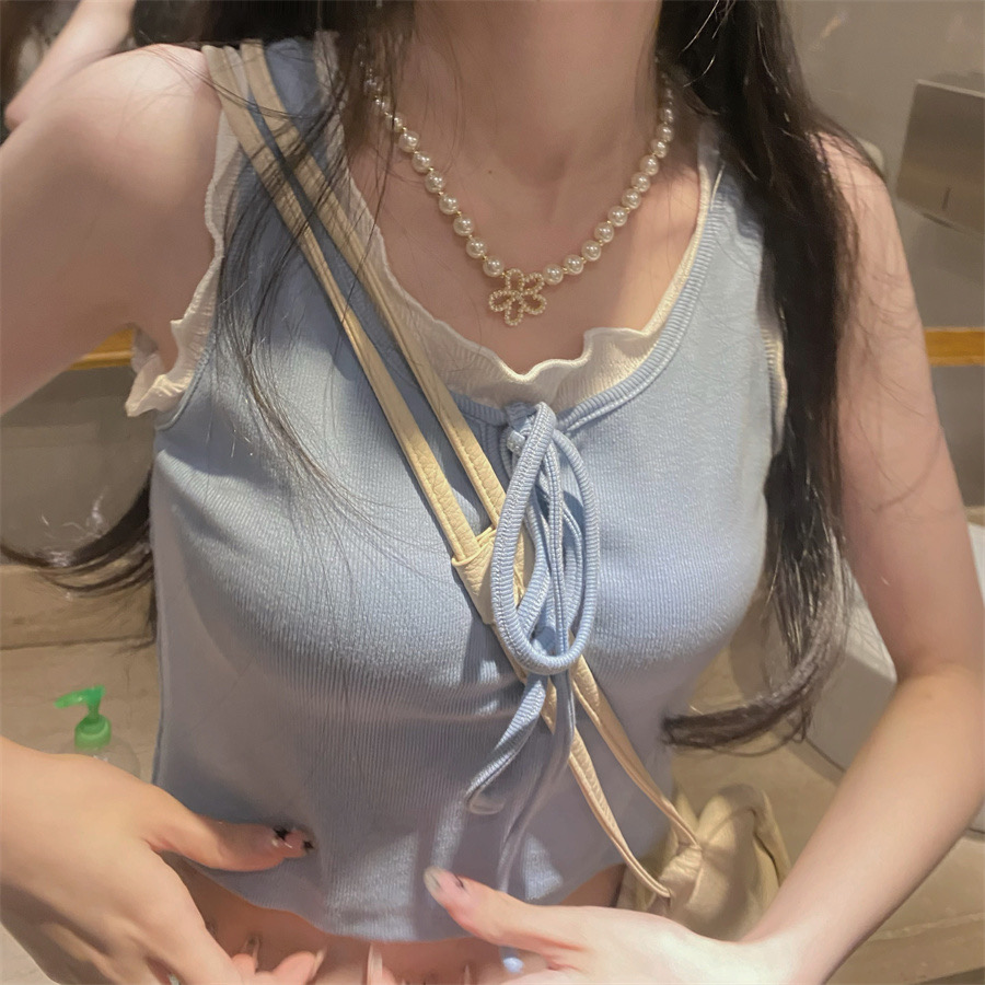 Summer Korean version superimposed fake two-piece suspenders outer top women's design short vest with sleeveless T-shirt trend