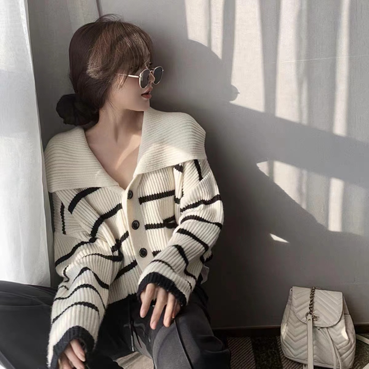 Gentle wind lazy sweater coat women's autumn and winter 2022 new French loose outer wear lapel striped knitted cardigan