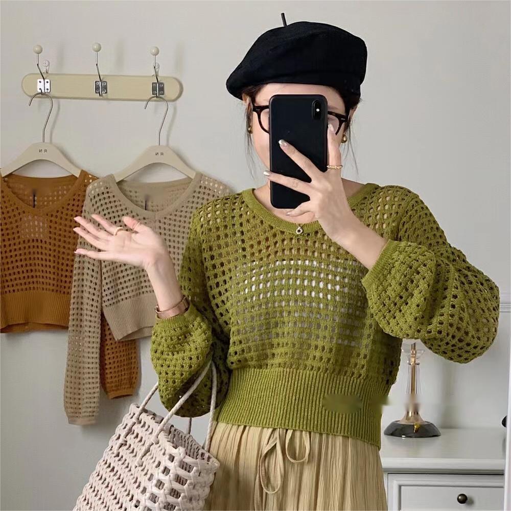 2022 new Korean version hollow V-neck long-sleeved thin knitted sweater T-shirt women's loose slightly transparent sunscreen shirt short top