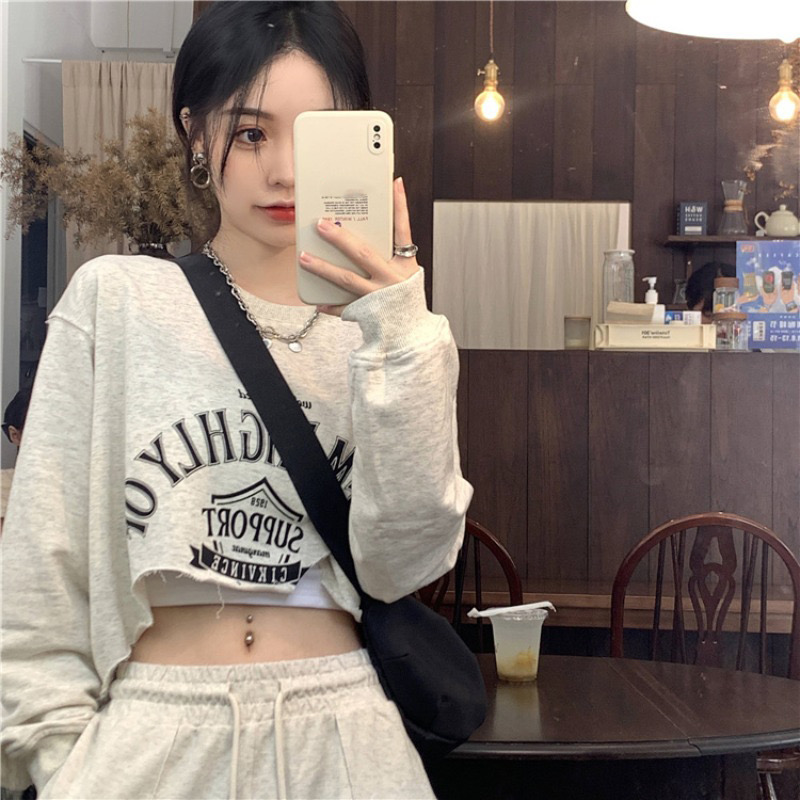 Loose irregular printed round neck sweater women's 2022 autumn new ins