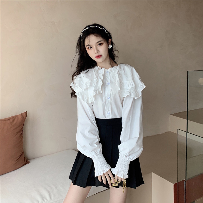 Design sense niche floral shirt female spring 2023 new doll collar tie shirt ruffled chic top