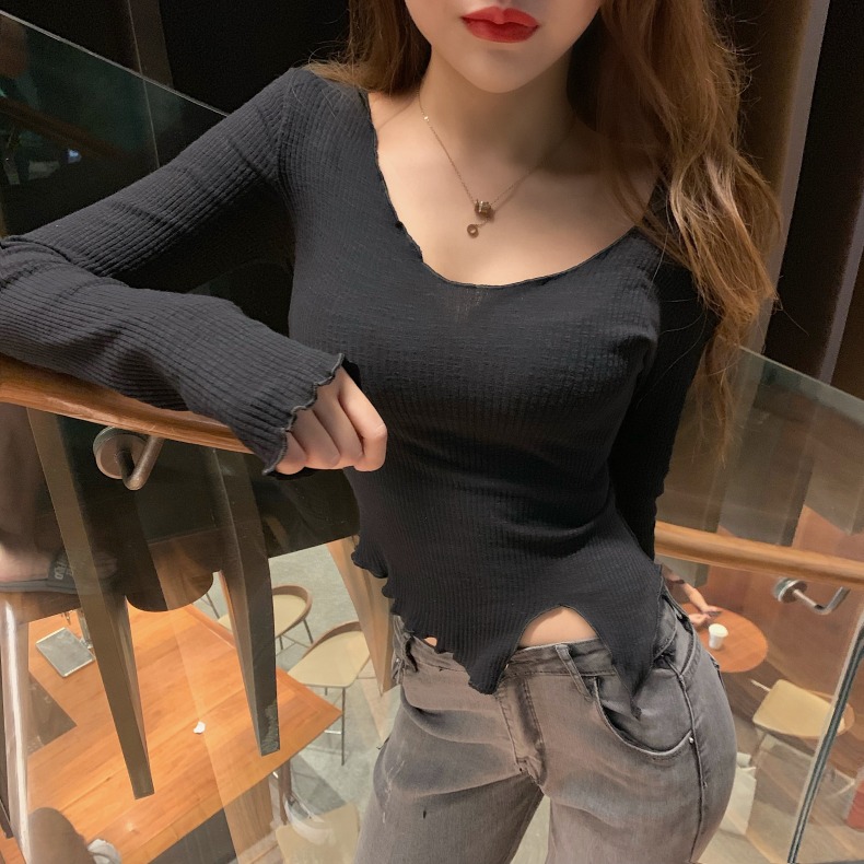 Korean version of simple basic wooden ear edge irregular bottoming shirt spring and summer new sexy low chest V-Neck long sleeve T-shirt for women
