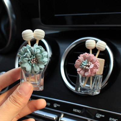 Car accessories, creative arts, car exhaust, perfume bottle, car air conditioner, air vent, aromatherapy and lasting fragrance.