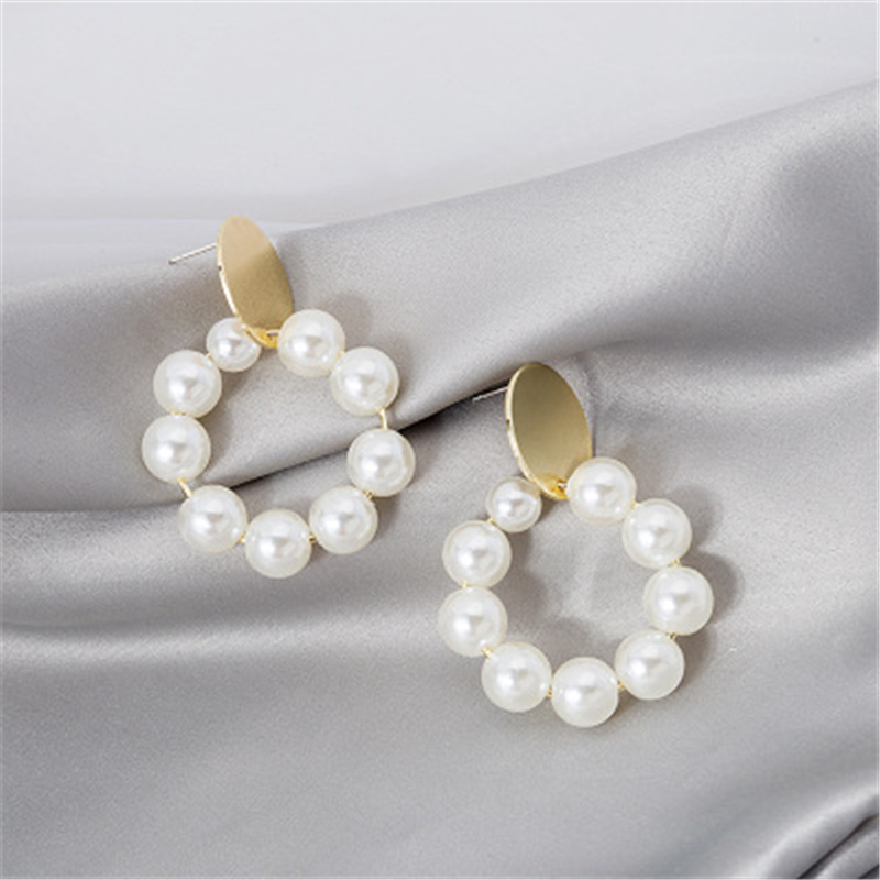 Real shot 925 silver needle exaggerated personality pearl Circle Earrings European and American cool wind earrings earrings earrings
