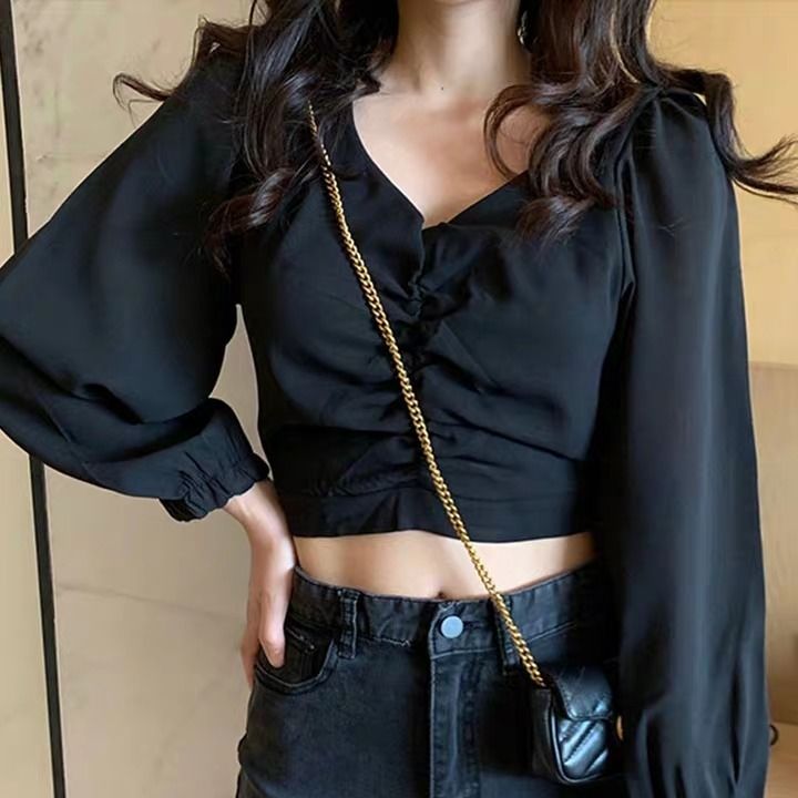 T-shirt women's design sense minority spring 2020 new chic Korean long sleeve bubble sleeve short black thin top