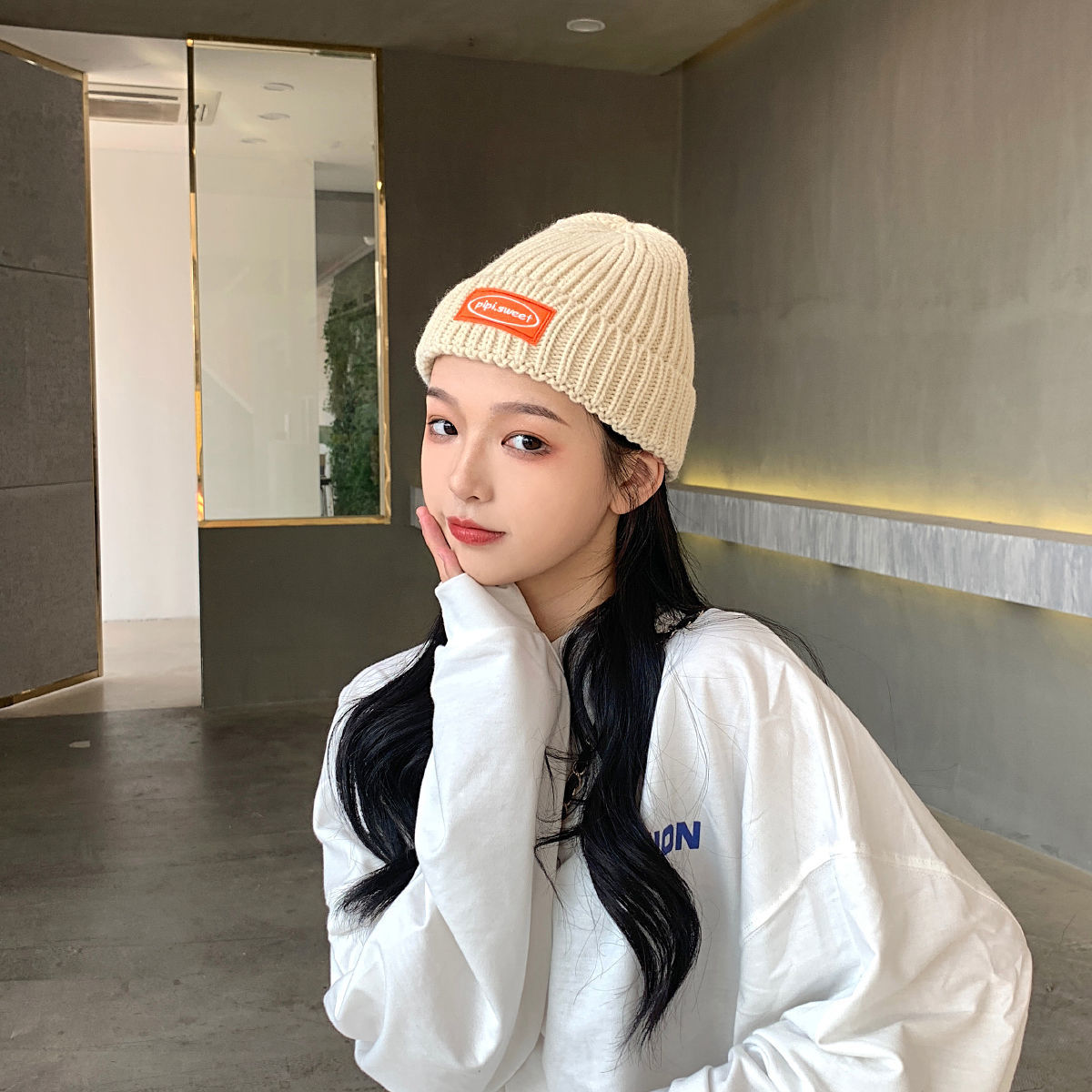 Korean thickened knitted hat women's casual label wool hat warm ear soft girl melon skin hat men's fashion