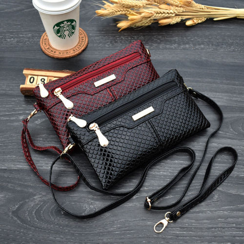 Spring bag messenger ins same women's messenger bag European and American fashion versatile Pu hand bag dual purpose bag