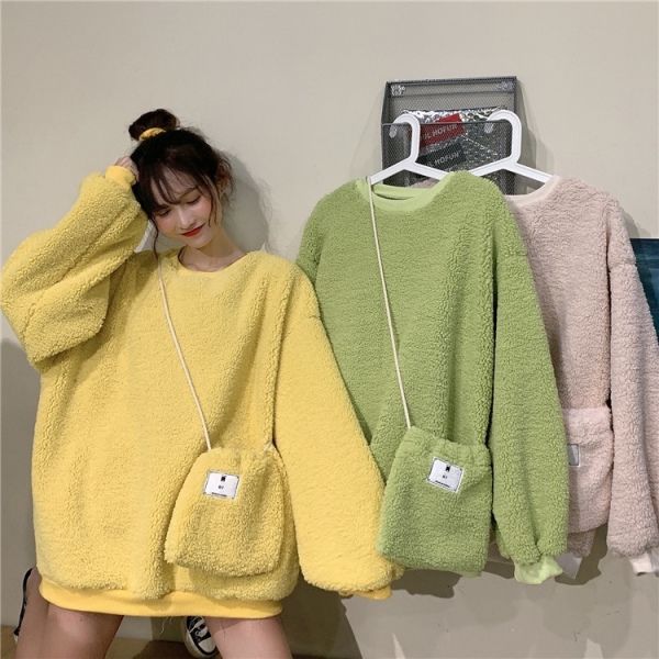 Spring and autumn new thin long sleeve sweater women's imitation lamb Plush thickened loose coat