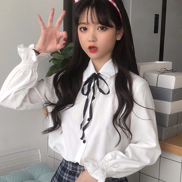 New white shirt female student Korean loose top showing thin trumpet sleeve lace up bottoming Shirt Long Sleeve Shirt woman