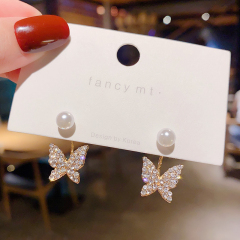 Real shot S925 silver needle Korean butterfly micro inlaid Zircon Earrings female super flash pearl earrings earrings