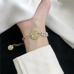 American fried ~ ins Style Bracelet Female Minority asymmetric personality human head pearl hand Ornament New Korean style simple temperament