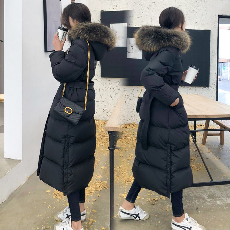 Down jacket women's long over the knee big hair collar 2020 new women's high grade thickened white duck down foreign style thin coat