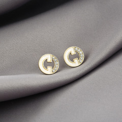 Real shot silver needle small fragrant style hollow out Round Earrings female small French cold style letter Earrings