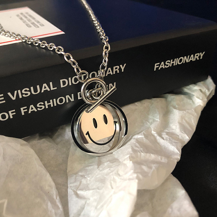 National fashion simple men's and women's revolving smile face pendant retro personality hip hop tiaodi couple necklace