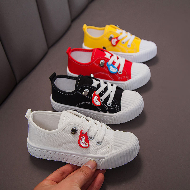 Spring and autumn 2020 small white small black shoes fashion versatile primary and secondary school children's running shoes children's casual canvas shoes