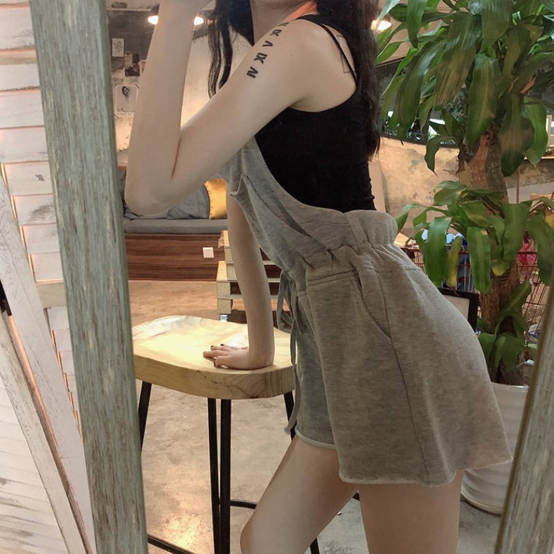Summer 2021 Korean leisure and fashion sports suit show thin suspender one piece wide leg shorts women loose net red