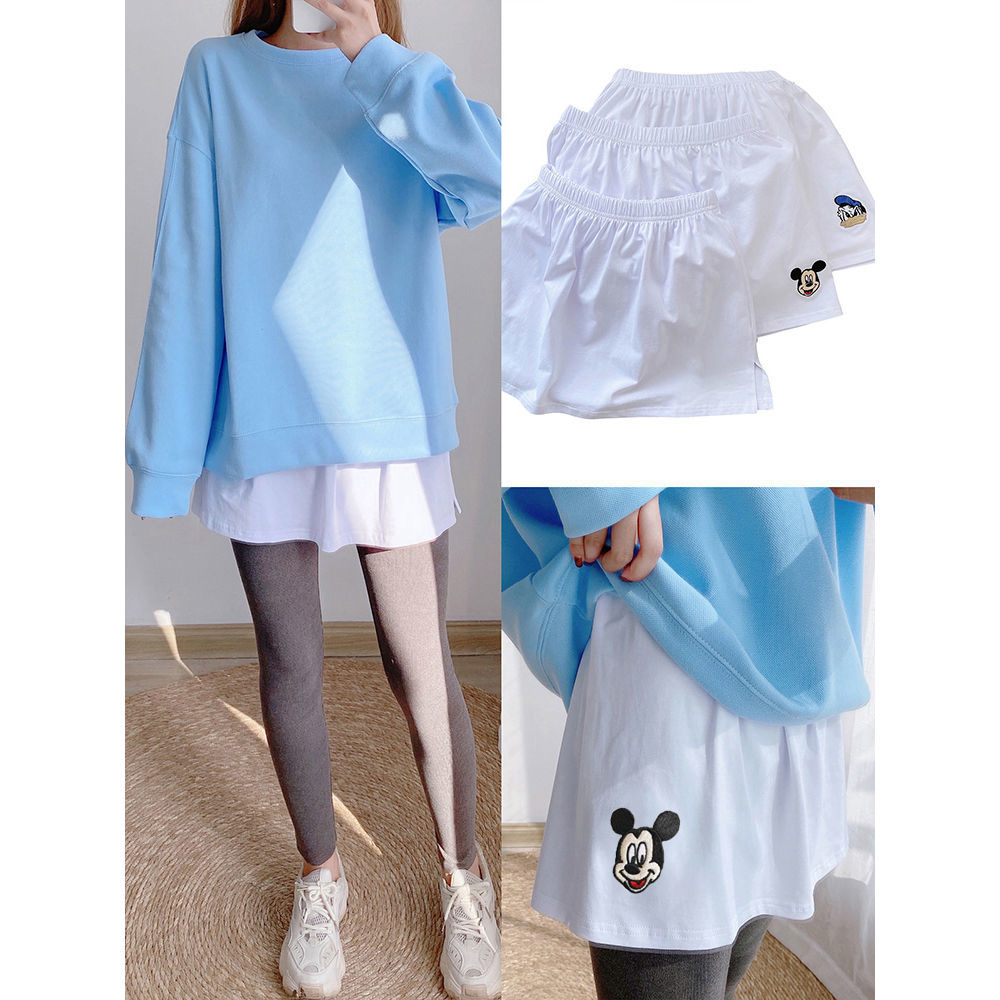 The bottom of the sweater with artifact in it, autumn dress, winter dress, half length skirt with exposed white edge and fart curtain