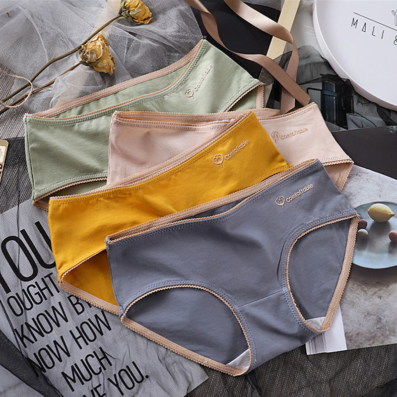 Traceless underpants female cotton antibacterial Student Korean version middle low waist adult women's triangle underpants underpants Japanese
