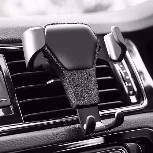 New car mobile phone leather support Car gravity sensing support clip type multi-function air outlet support