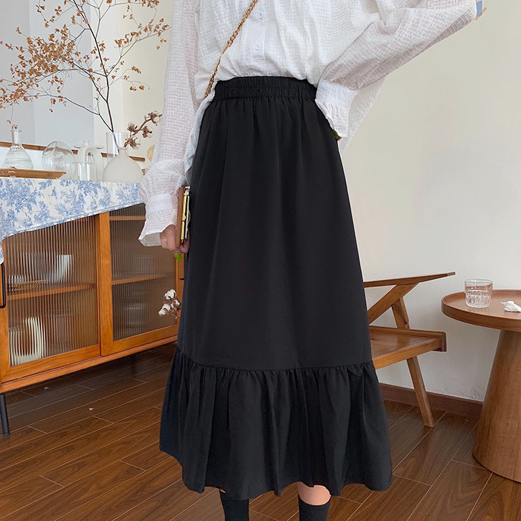 Real-price Korean version of the long fish-tail skirt retro literary and artistic loose A-shaped skirt, tight waist half-length skirt