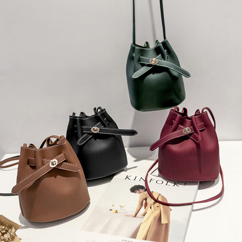 New simple egg shaped bucket bag broadband buckle small bag Korean leisure solid color single shoulder diagonal bag