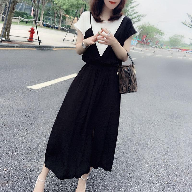 European station summer dress women's new European goods tide close waist thin medium and long skirt black temperament popular dress