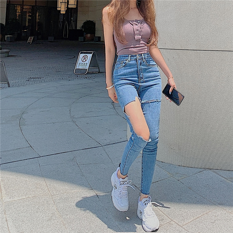 Real price! Korean version chic tight elastic baggy hip jeans