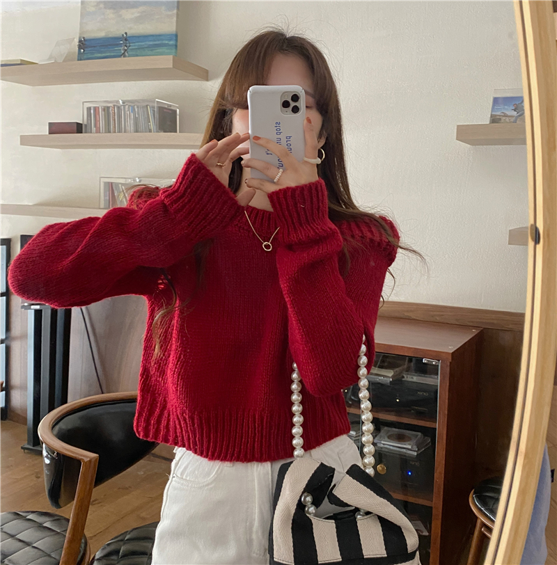 Real shooting and real price Korean version of autumn and winter 2021 design sense bubble shoulder pad sleeve sweater short careful machine sweater