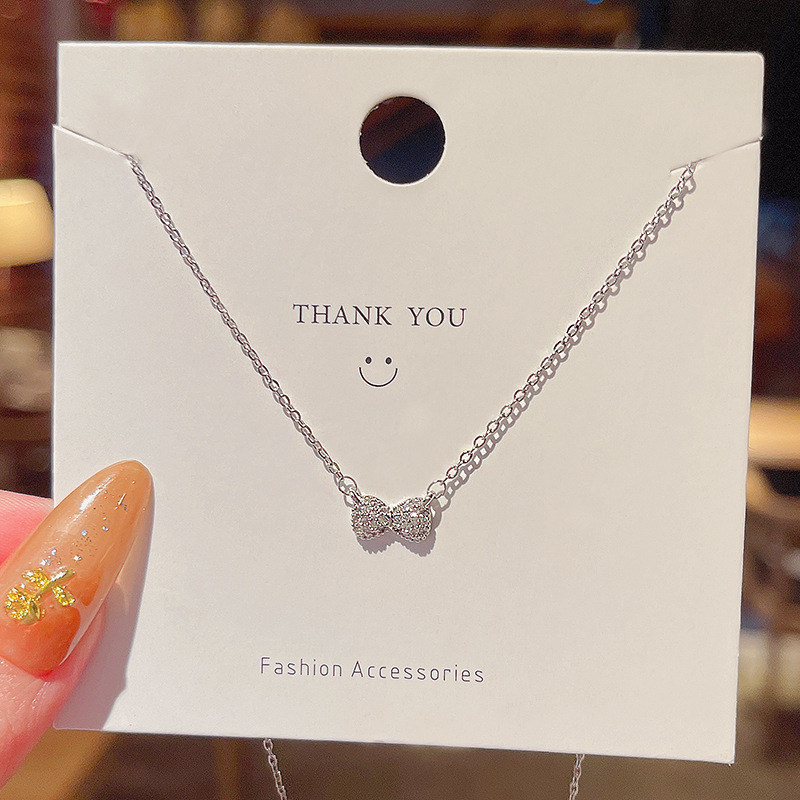 Real shooting simple minority design Bow Pendant titanium steel necklace women's fashion clavicle chain