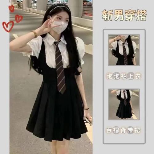 2022 new Korean version of French college retro bubble sleeve short sleeve top hot girl slim strap skirt two-piece set