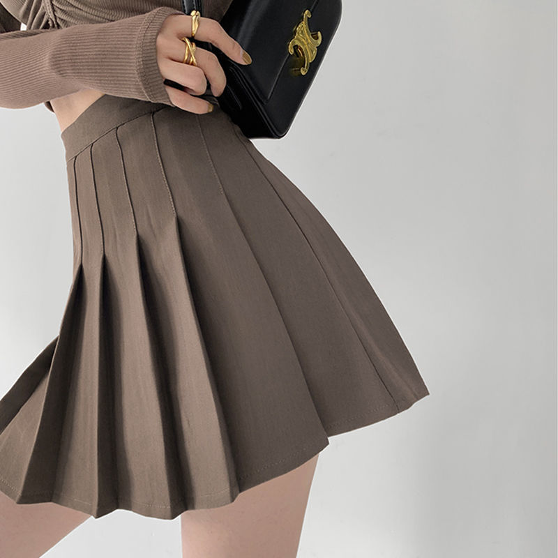 Pleated skirt women's 2022 new spring and autumn black high waist A-shaped short skirt white college style anti tarnish skirt summer