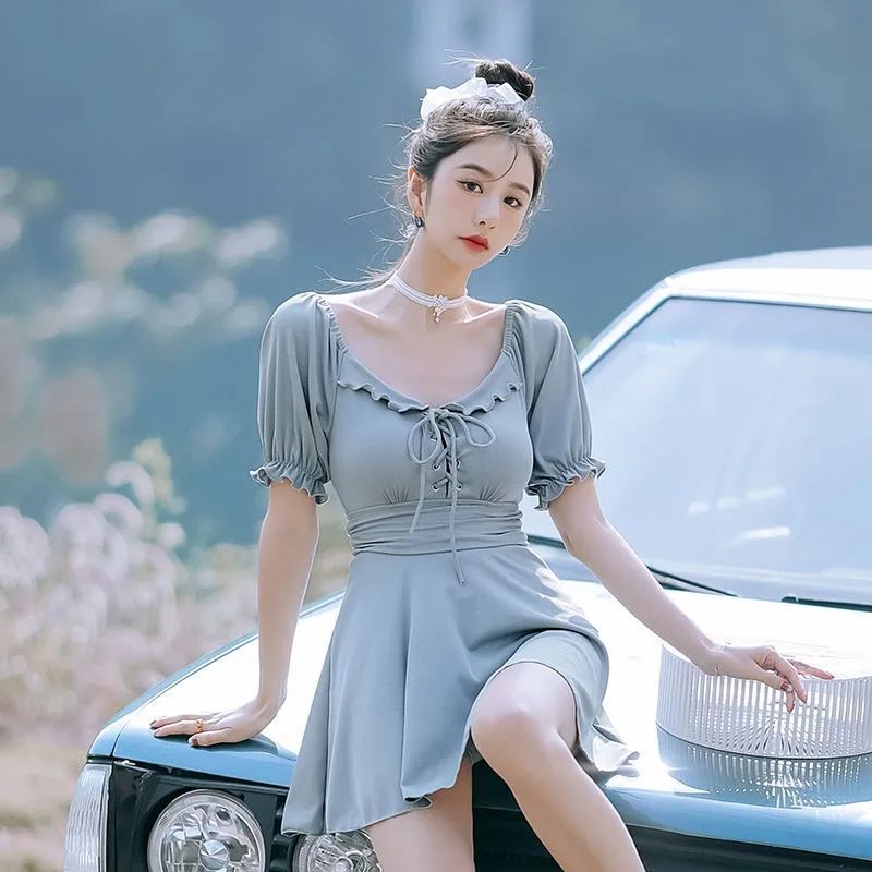 2022 new one-piece swimsuit women's bathing in hot spring to cover their belly and show their thin skirt style conservative ins super fairy flat angle to cover their flesh swimsuit