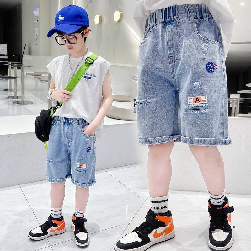 Boys' hole breaking shorts 2022 summer new middle-aged and big boys' Denim Capris loose handsome casual shorts super soft