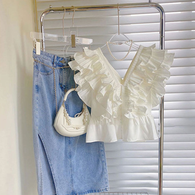 Small fragrance suit women's summer 2022 new high-end sense of minority design French white shirt skirt two piece set