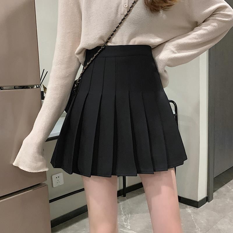 Pleated skirt women's autumn and winter short black skirt 2022 new foreign style high waist A-line skirt JK short skirt