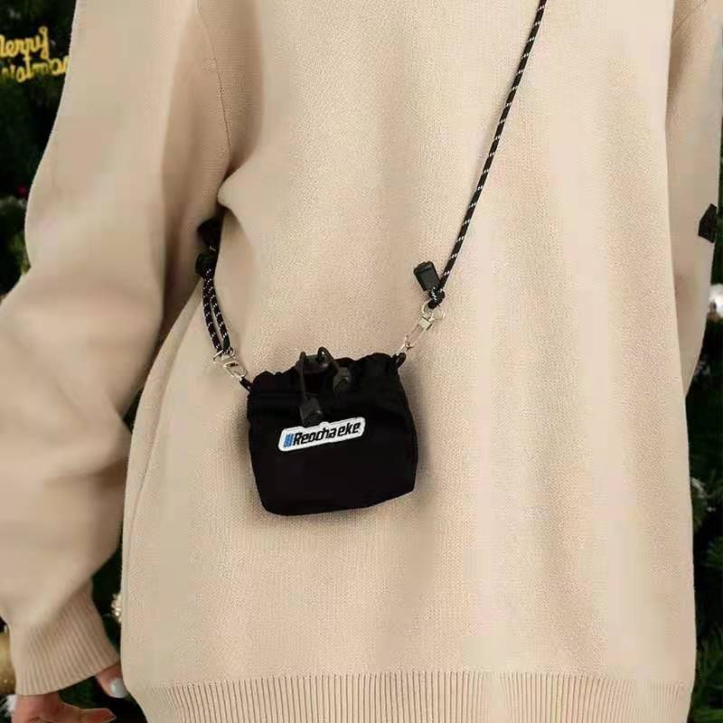 Korean fashion brand versatile Mini messenger bag mobile phone bag niche design drawstring headset bag zero wallet