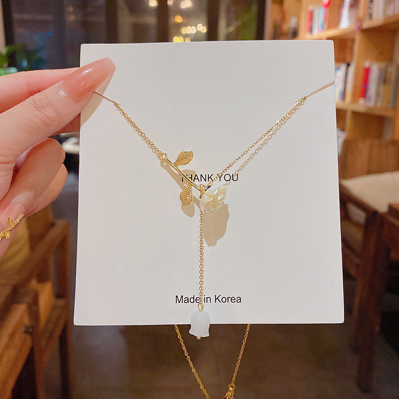 Korean small fresh rose titanium steel necklace ins fashion simple long tassel pendant collarbone chain