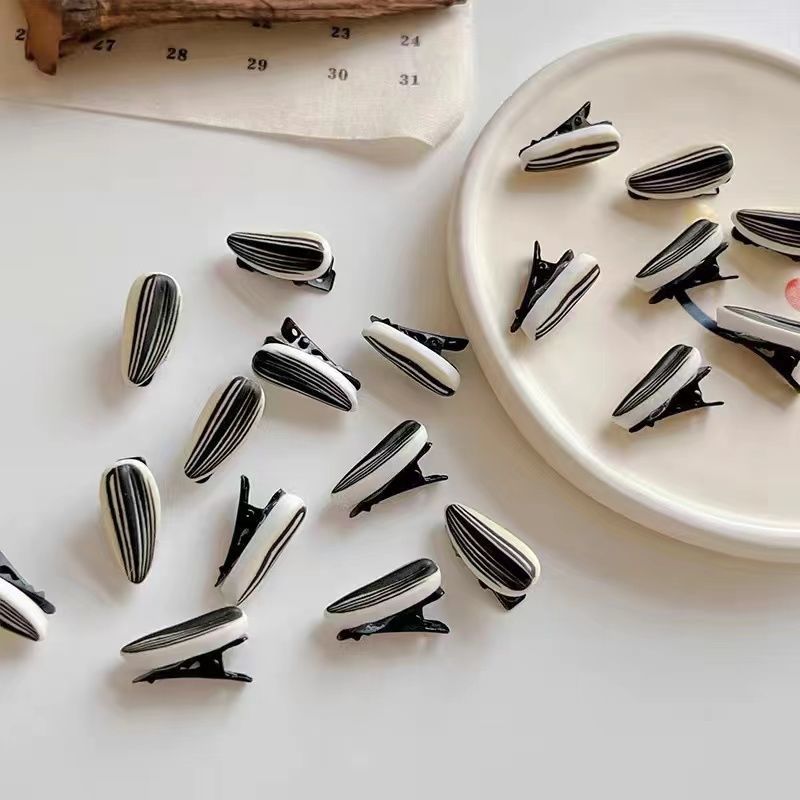 Simulation funny melon seed hairpin female side forehead banger hairpin summer cute funny duckbill clip headdress