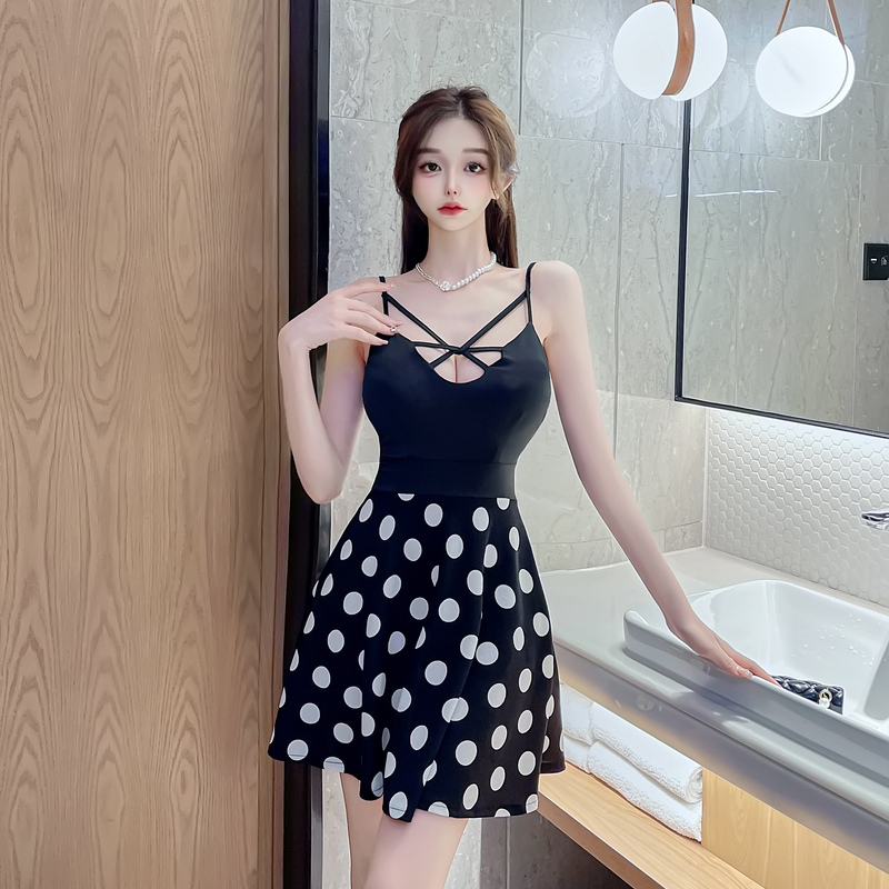 Real shooting temperament design sense net hollowed out cross bandage low chest wave point splicing sling big swing dress