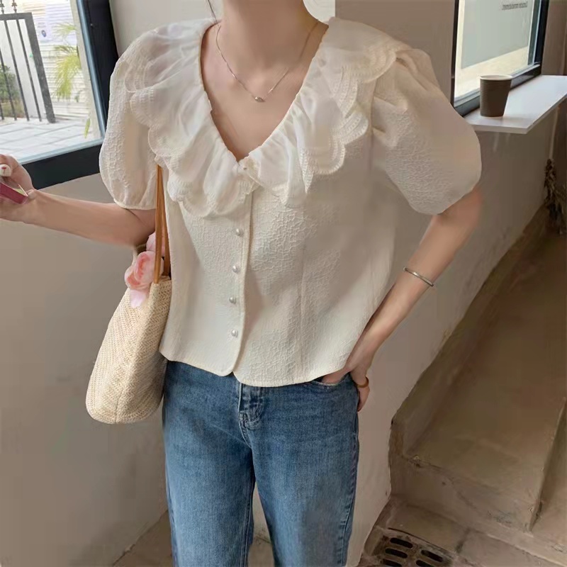 Korean spring and summer 2022 new French doll collar shirt temperament single breasted V-neck bubble sleeve short top women