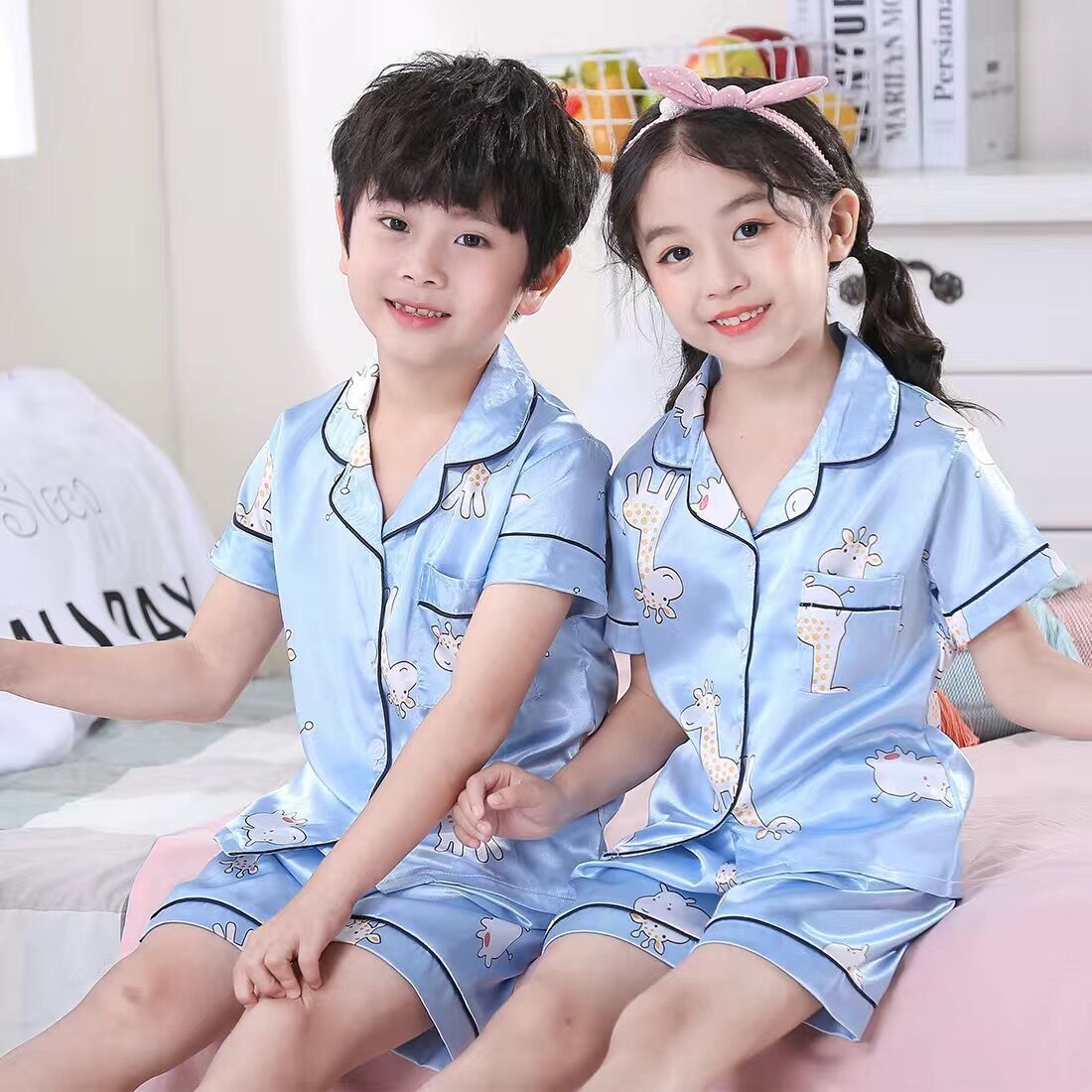 Children's ice silk pajamas summer thin style boys' and girls' home clothes boys' air conditioning clothes spring and summer short sleeved suit