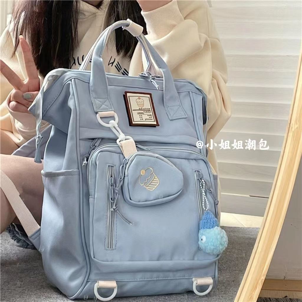 Schoolbag female Korean ins girl heart college wind high school student backpack Japanese wild large-capacity backpack