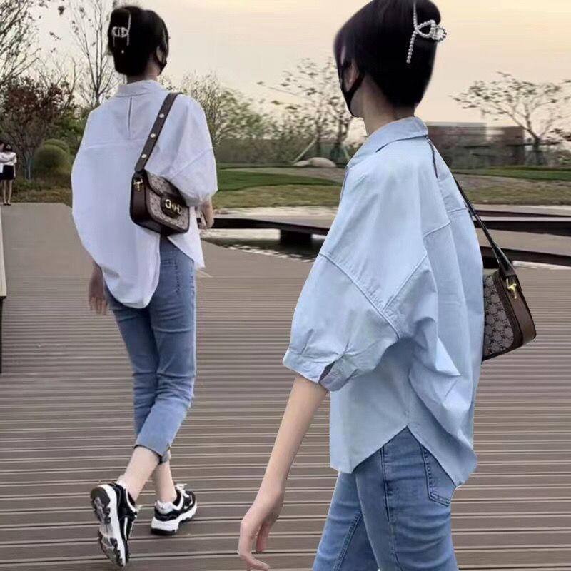 Short-sleeved shirt women's 2022 summer new loose casual design sense cover the stomach back hollow shirt cardigan