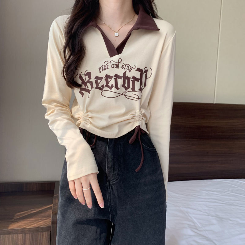 Long-sleeved T-shirt women's Korean version of the new Polo collar design sense of small hit color drawstring design sense of high waist top ins